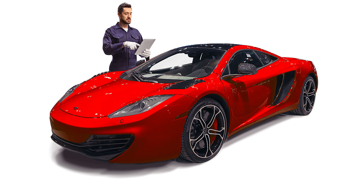 man-inspecting-a-red-supercar-at-car-service-2-